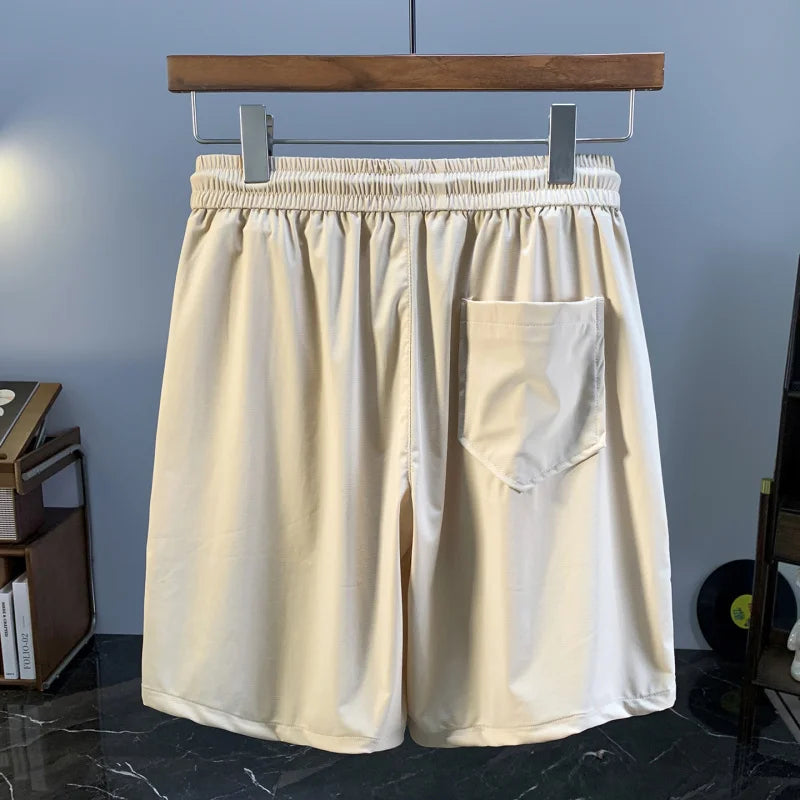 Summer thin ice silk men's shorts trend Korean version casual sports loose quick drying breathable mid pants